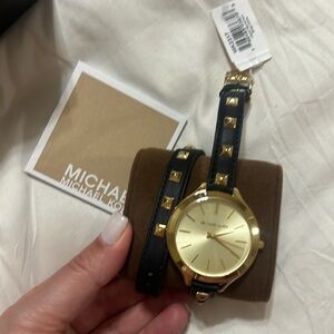 Black and cold Michael Kors watch